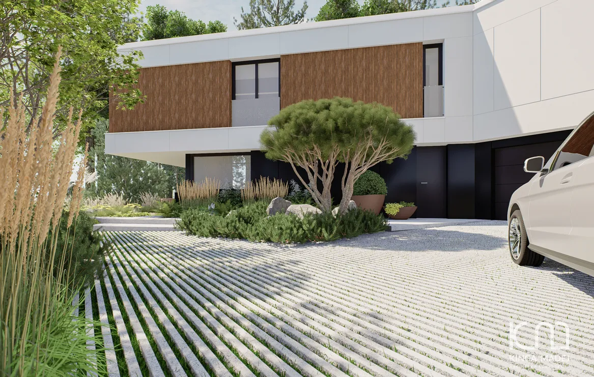 Widok na wejście do domu i bramę garażową. Wodoprzepuszczalny podjazd z kostki z hydrofugą.