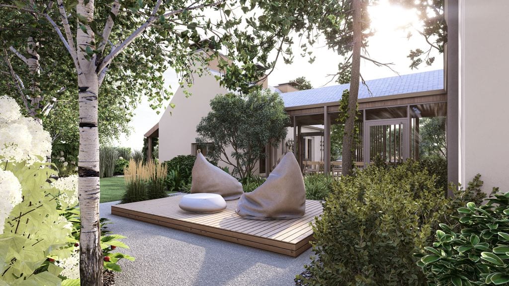 Tylny taras z widokiem na brzozy, hortensje i trzcinniki