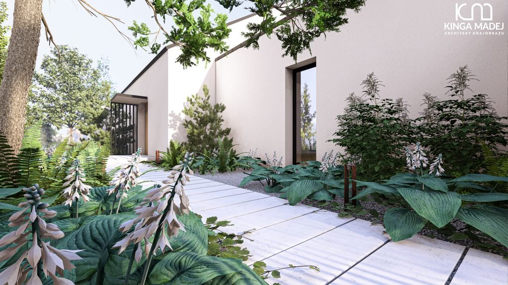 Ścieżka prowadząca do wejścia otoczona nasadzeniami w stylu leśnym